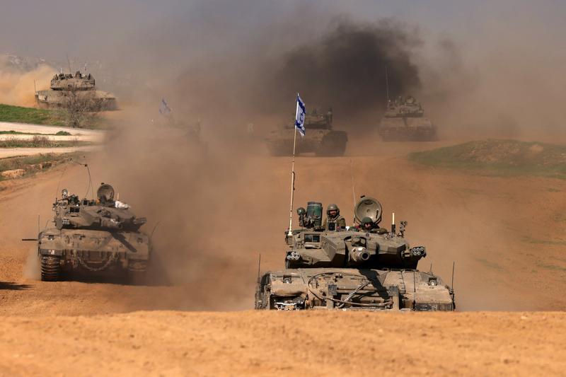 Tancuri israeliene care se întorc din Fâșia Gaza, Foto: Menahem Kahana / AFP / Profimedia Images