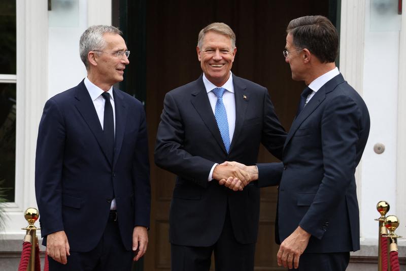 Jens Stoltenberg, Klaus Iohannis și Mark Rutte, Foto: Simon Wohlfahrt / AFP / Profimedia